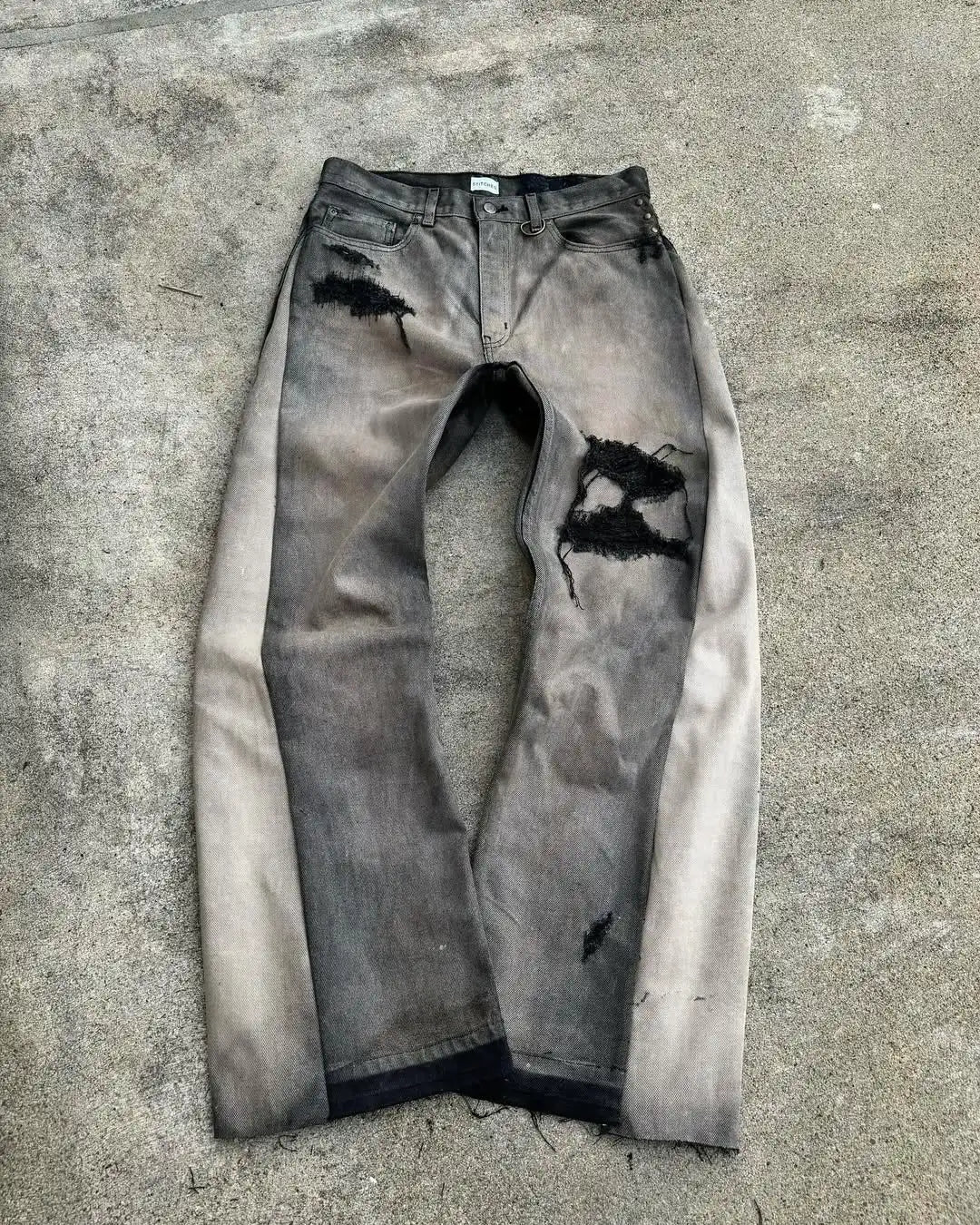 FRAYED PATCH JEANS
