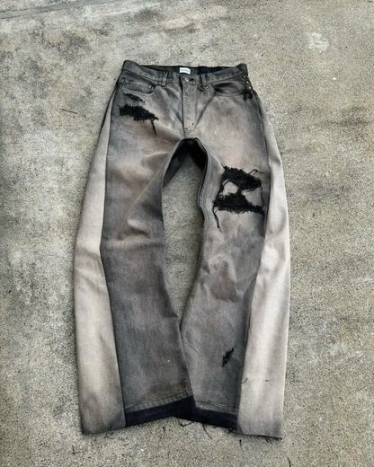 FRAYED PATCH JEANS