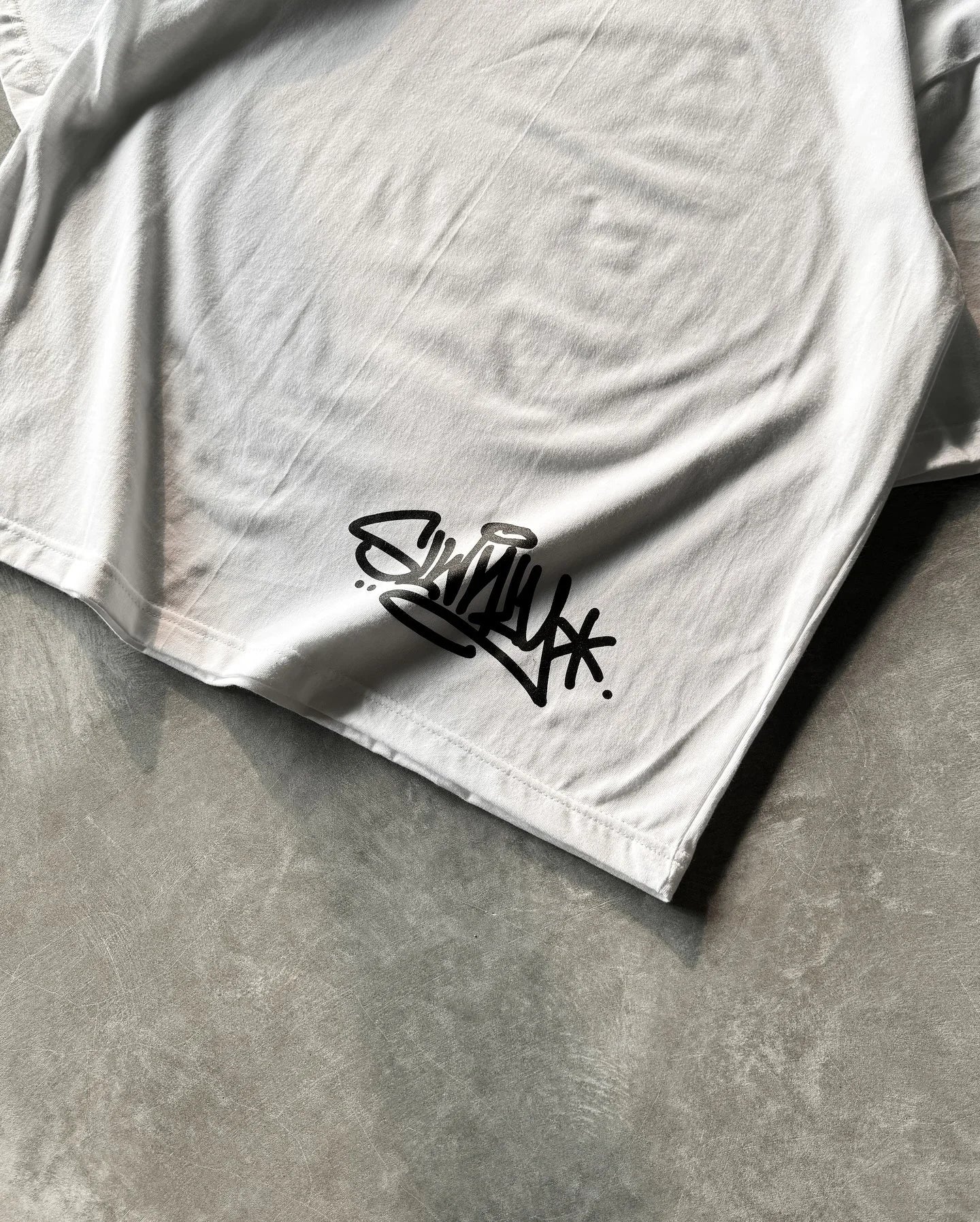 TAGGED TEE
